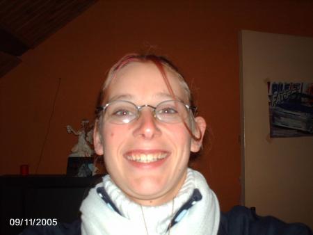 Là c'est ma maman qu'est ce qu'elle est belle! je comprend pourquoi papa la choisi. Je t'aime maman
